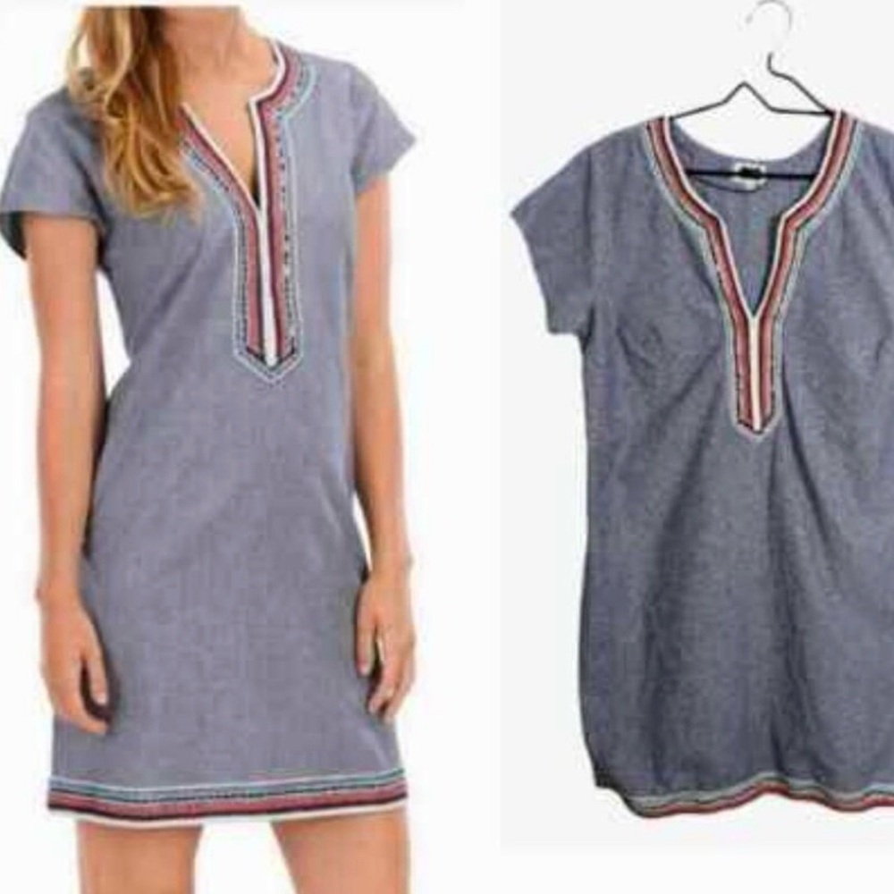 Blue Chambray dress by MudPie. Embroidered Neckline and hem. 100% cotton  Size M